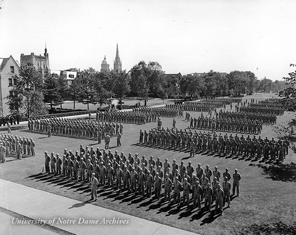 Naval V-7 Military Training Units in formation on South Quad during World War II, 1942.
